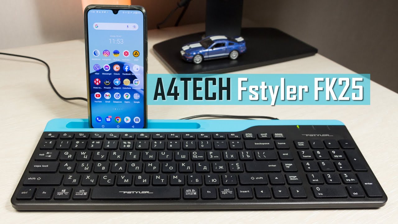 A4Tech Fstyler FK25 - універсальна доступна клавіатура з тримачем для смартфона.